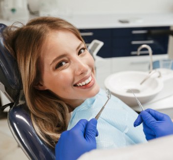 photo of dentist with patient