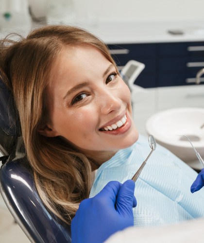 photo of dentist with patient